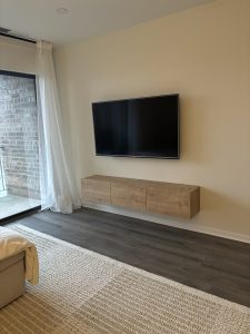 In-progress TV mounting with wall bracket and wiring by Flash Handy handyman service