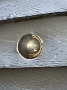 Clean cut hole through siding for new exterior vent installation